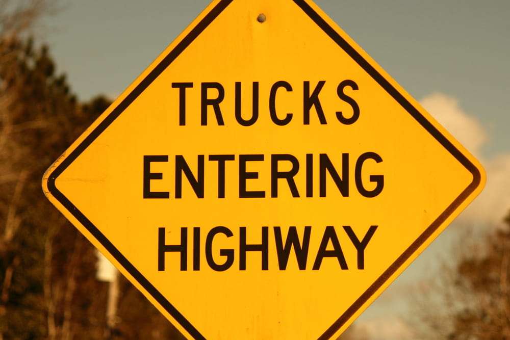Traffic sign warning of trucks entering the highway, a blind spot (No-Zone) area in Houston